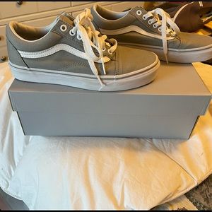 Gray 8.5 women vans that have never been worn.